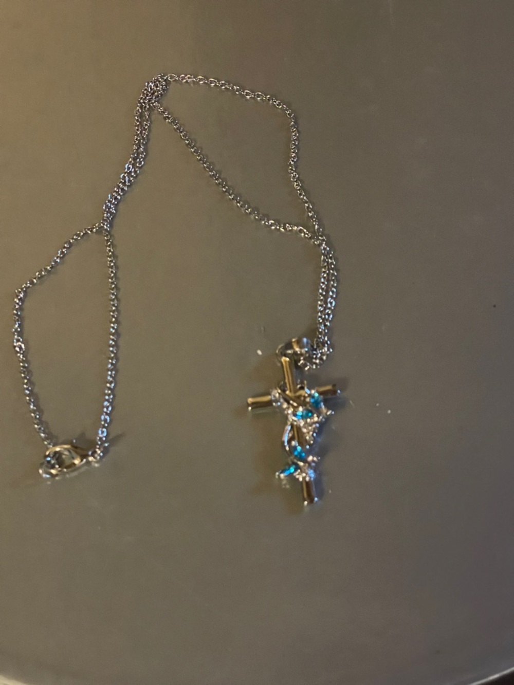 Silver and blue cross necklace
